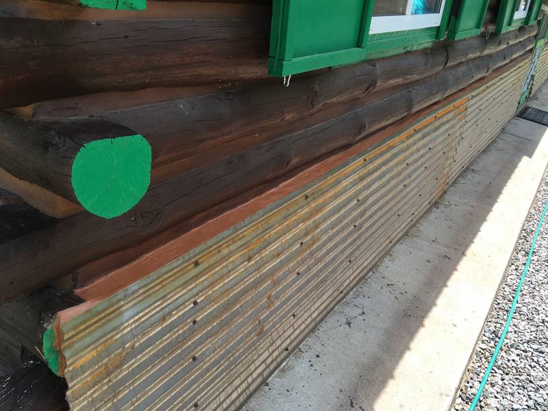 Log home chinking and staining detail — Rocky Top Painting Durango CO